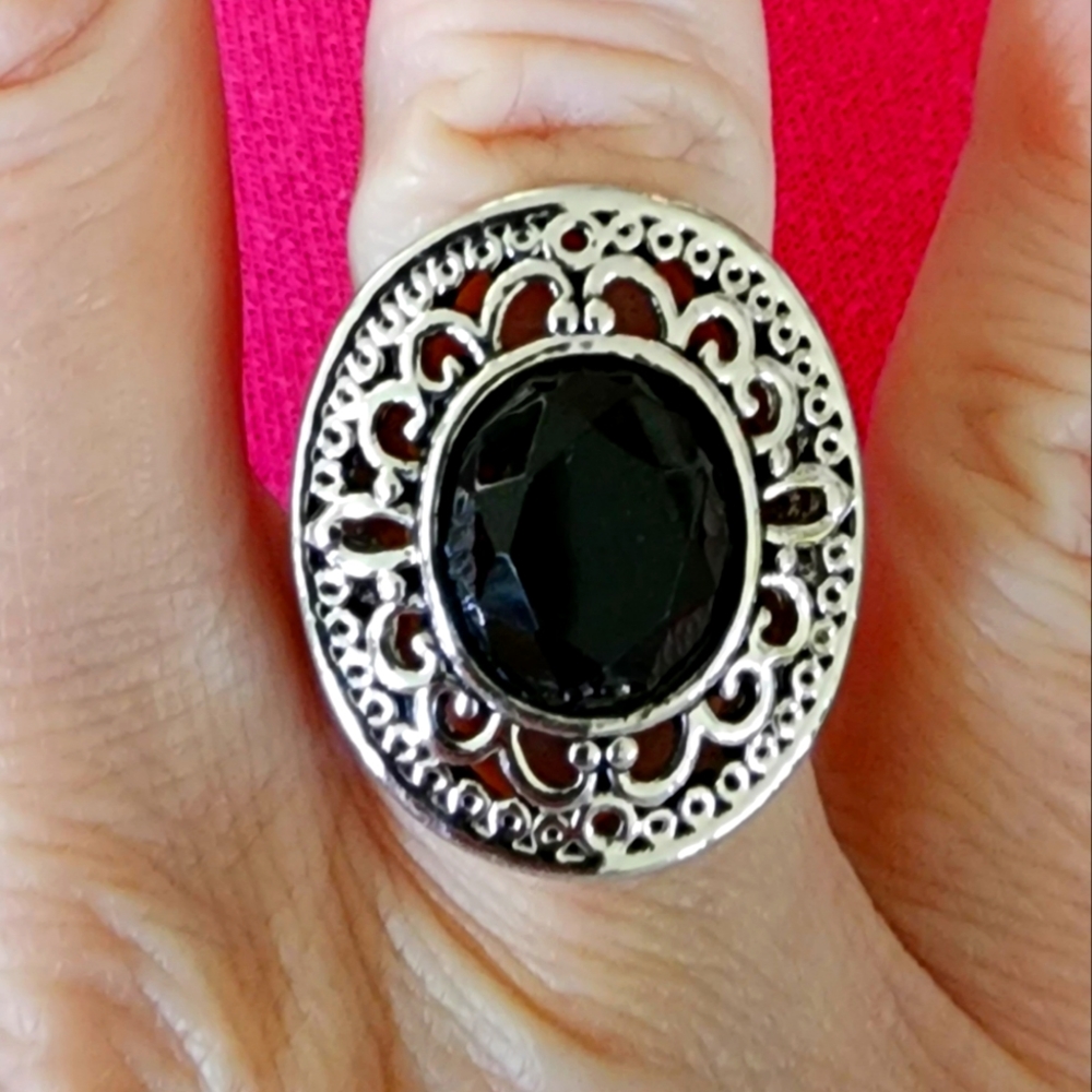 Black Stone surrounded by beautiful  filigree